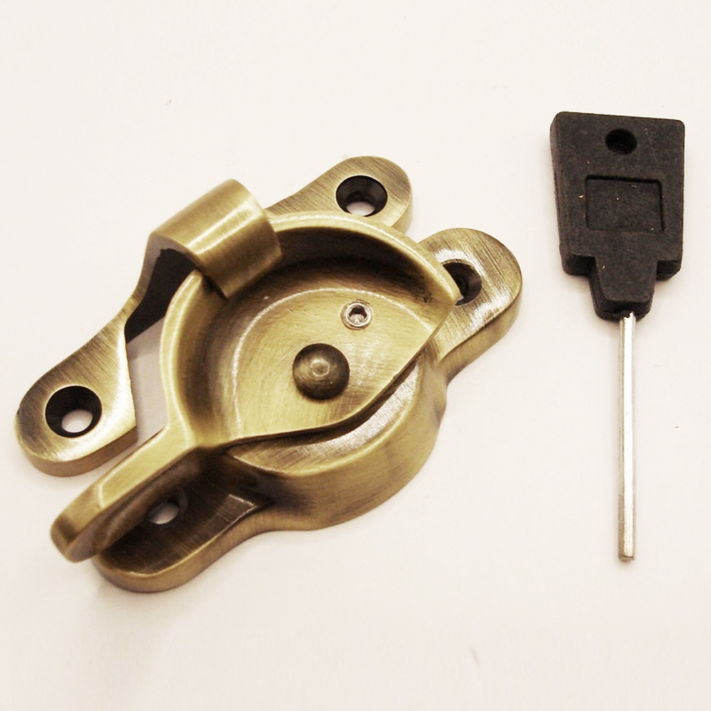 TWC002L/AB • Locking • Antique Brass • Forged Fitch Sash Fastener